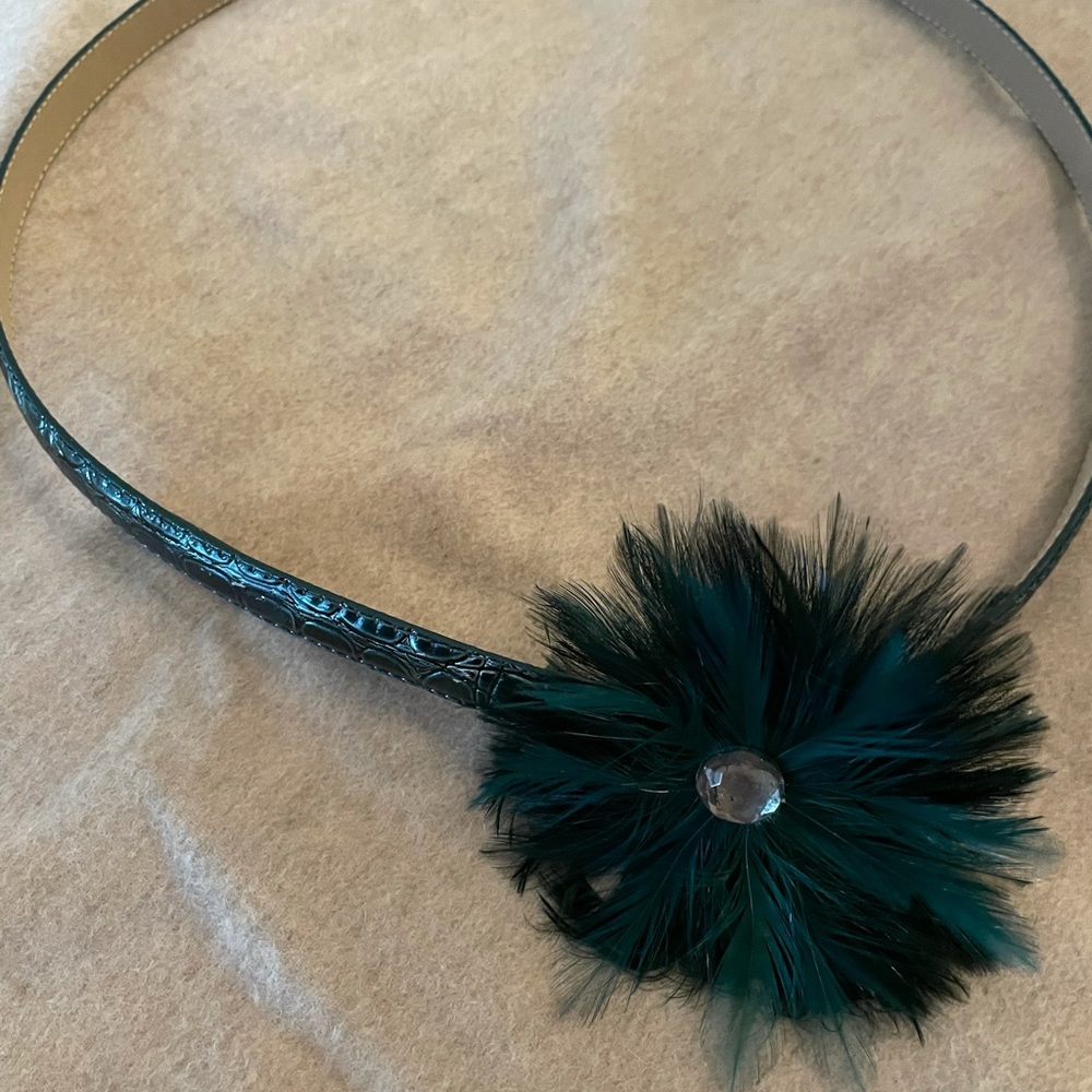 Teal/green belt with feather embellishment